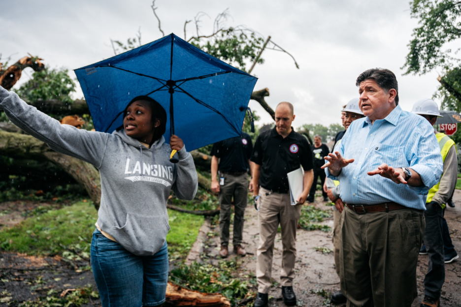 Governor Pritzker speaks with Lansing homeowner.