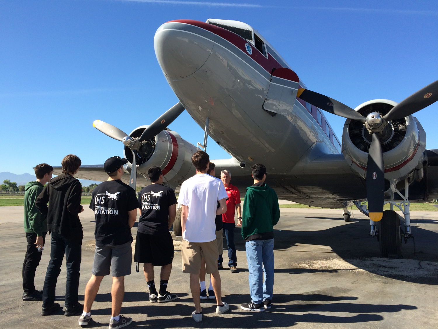 Aviation II students at Canyon High School toured Flabob airport and sat inside this DC-3 while learning the history of the airplane. Then they took turns sitting in the cockpit.