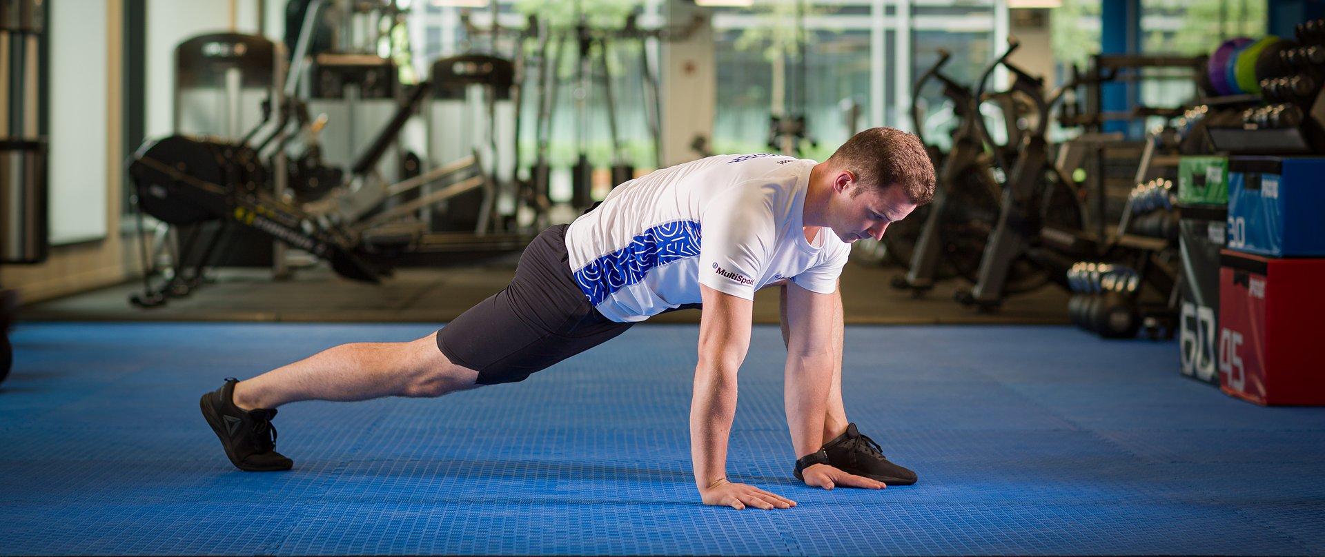 A sports trainer advises on how to safely return to physical activity after a break