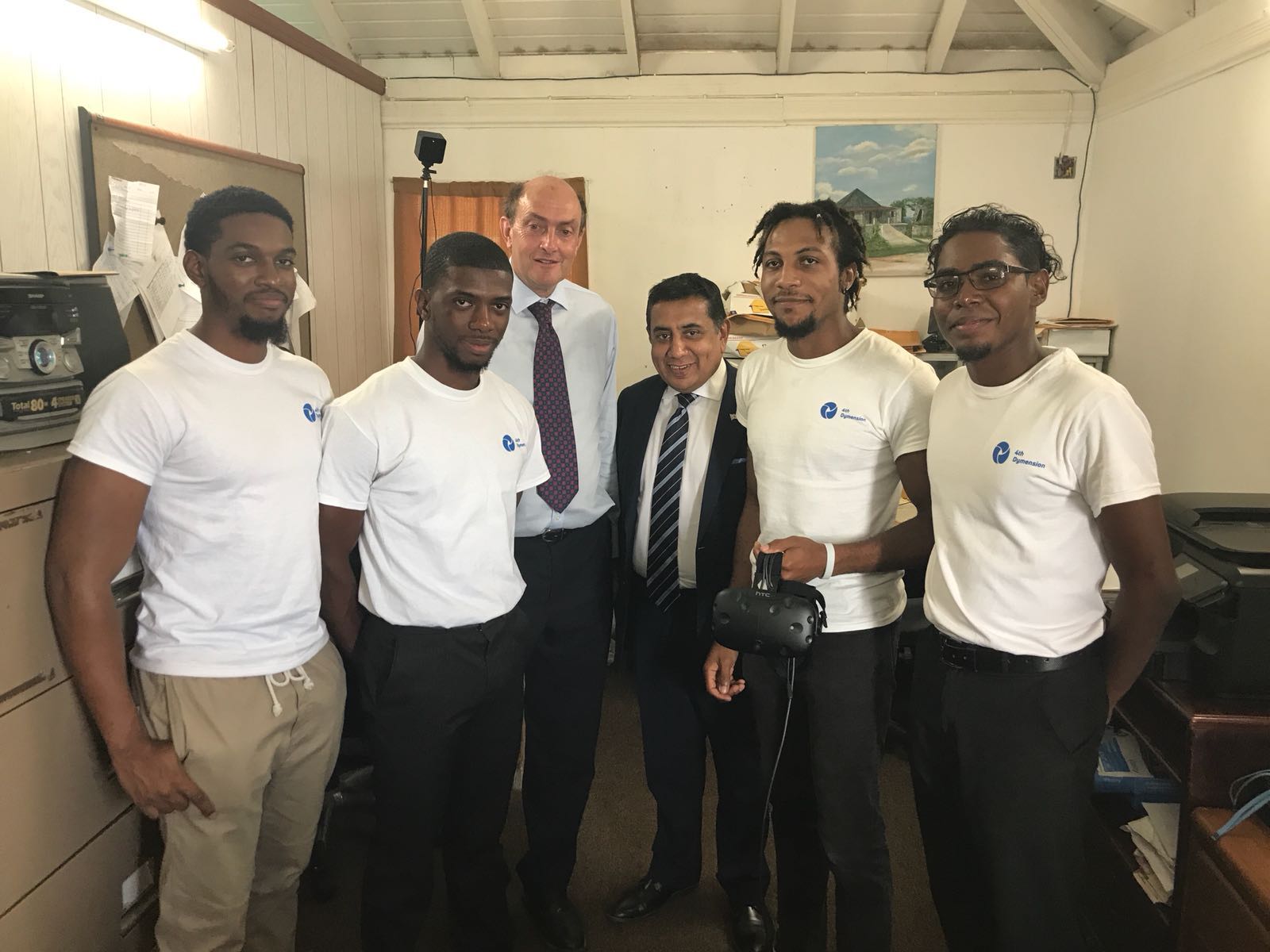 4th Dymension Team meets Minister of State for the Commonwealth and UN, Lord Ahmad, with the Governor of Montserrat, His Excellency Andrew Pearce.
​ (Left to right: Jhovan Daniel, Carlon Braithwaite, HE Andrew Pearce, Lord Tariq Ahmad, Jerely Browne, Dexter Small)