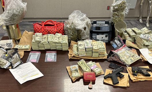 Gun, drug, and currency seizure