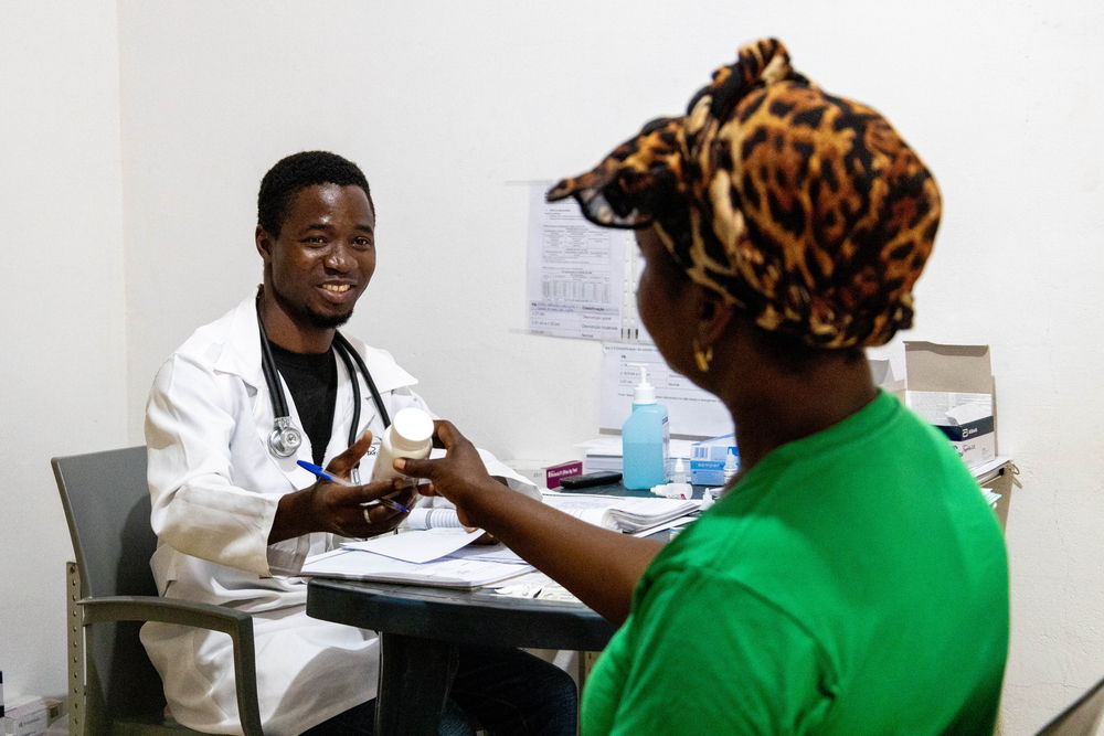 Maria Atonio, 43-years-old farmer from Macomia, talks to MSF’s Clinical Officer Mussa Rahamane Waide at MSF’s Clinic in Nanga, to receive ART and monitor her health. Photographer: Martim Gray Pereira| Location: Mozambique| Date: 31/10/2023