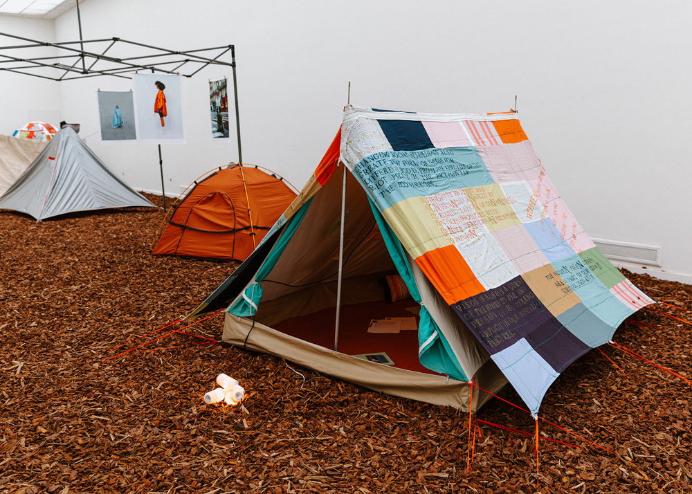 Fitting In. Installation view Camping Multitude, Z33, Hasselt, 2022. 
 [from front to back] Woman Cave Collective (Léticia Chanliau & Chloé Macary-Carney), ADIFF Angela Luna, Lotje Heidingsfeld
Photo: Selma Gurbuz
