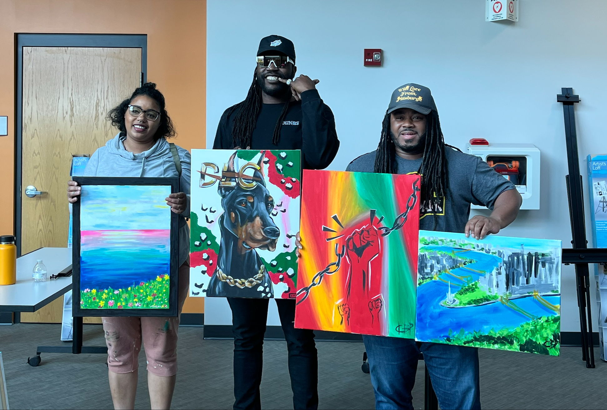 Local artists Takara Canty (left), Camerin Nesbitt and Cue Perry were the featured artists at DLC's Juneteenth celebration on June 10, 2023.