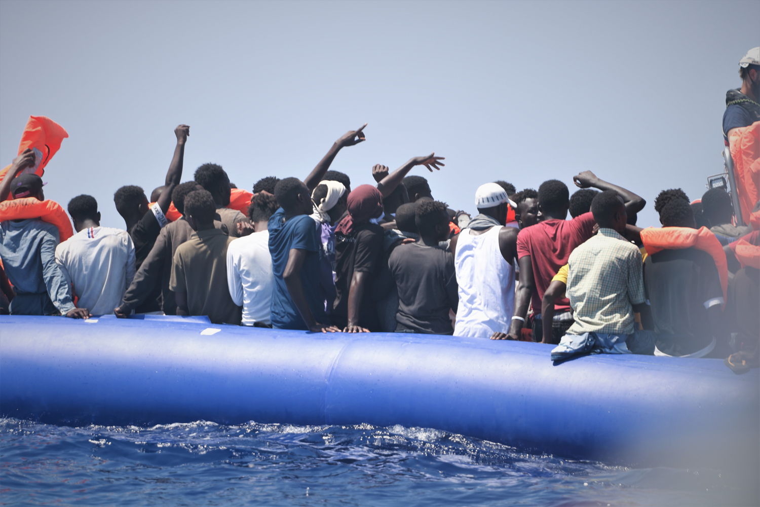A group of people in distress in a rubber boat before being rescued 12.08.19. Copyright: Hannah Wallace Bowman/MSF