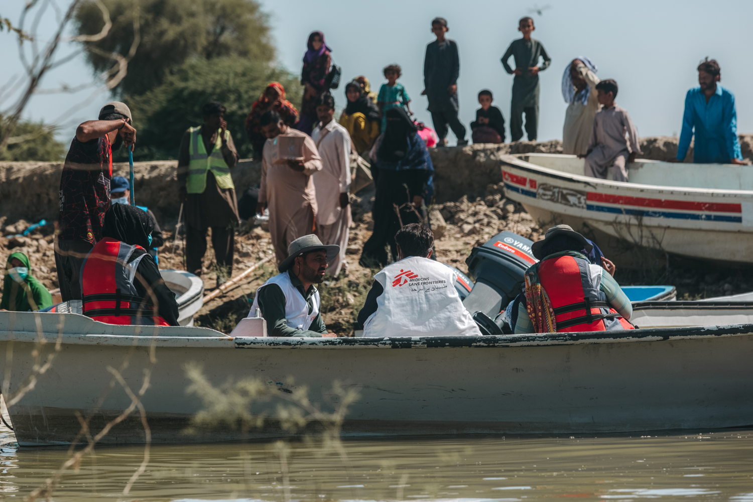 MSF’s medical team travelling by boat to run mobile clinics in Johi town, Dadu district, Sindh (c) Asim Hafeez