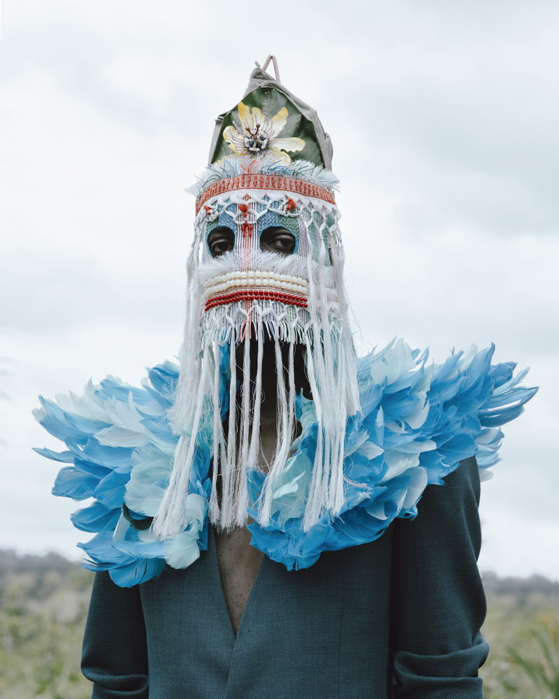 Baloji, Peau de Chagrin x Bleu de Nuit, 2018 - Wearable head sculpture by Damselfrau, garment by Brandon Wen © Photo: Kristin-Lee Moolman