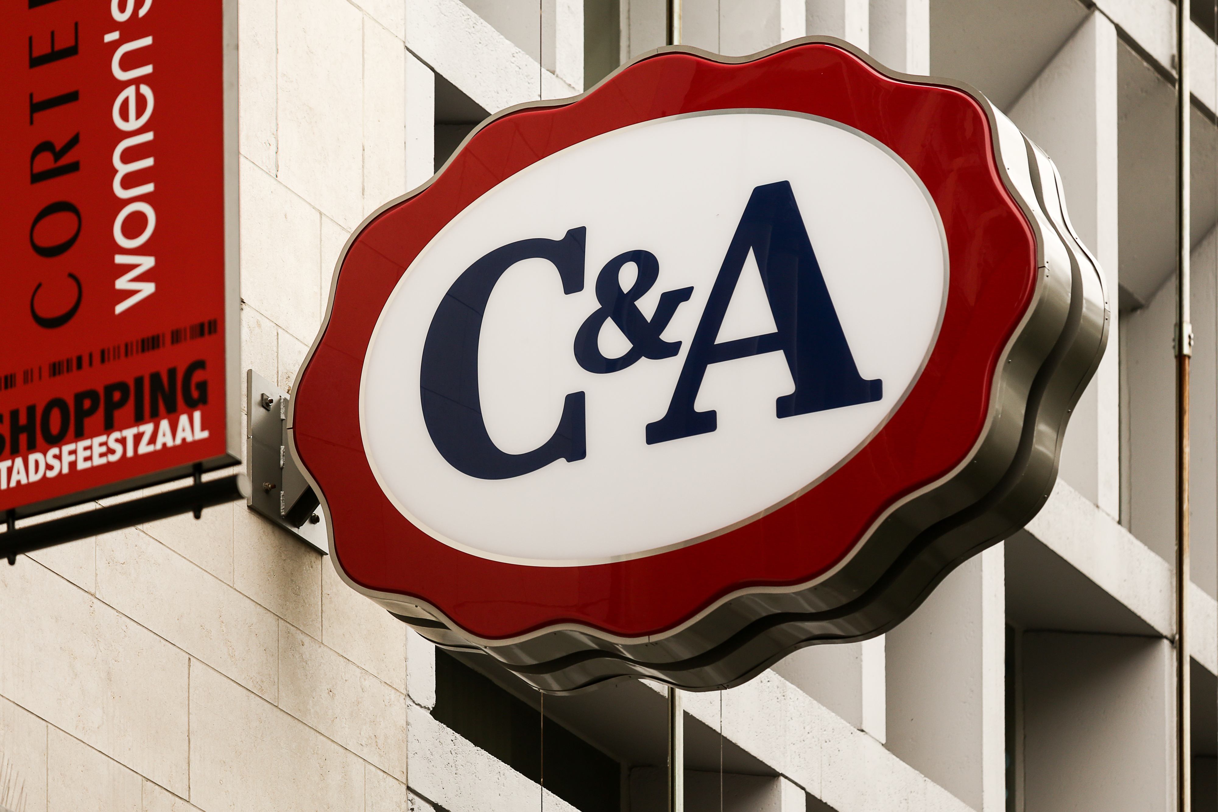 C & A plans to open 100 new shops in Europe over the next three years -  ACROSS