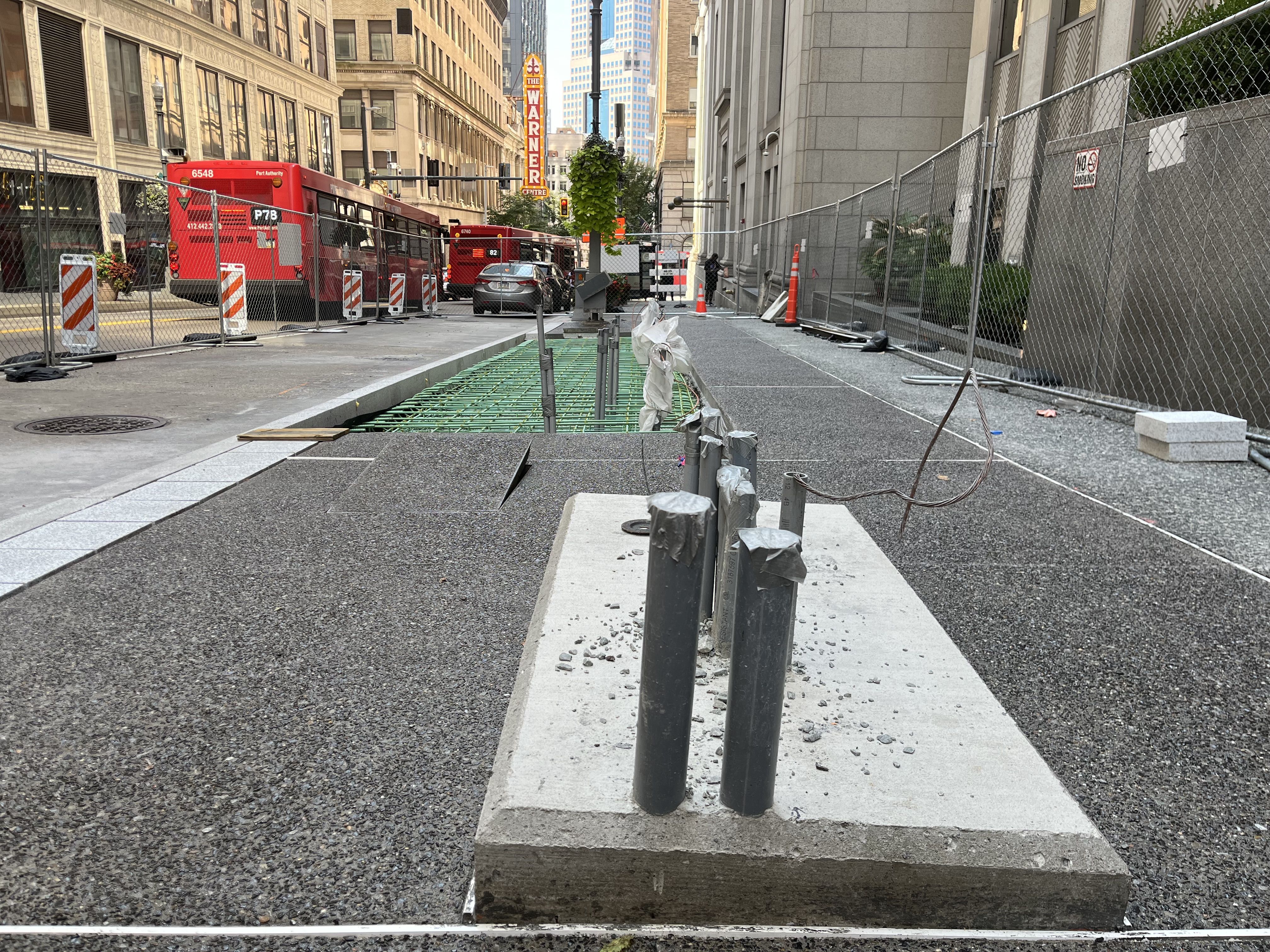 Exposed aggregate concrete sidewalk recently placed at William Penn Place Station