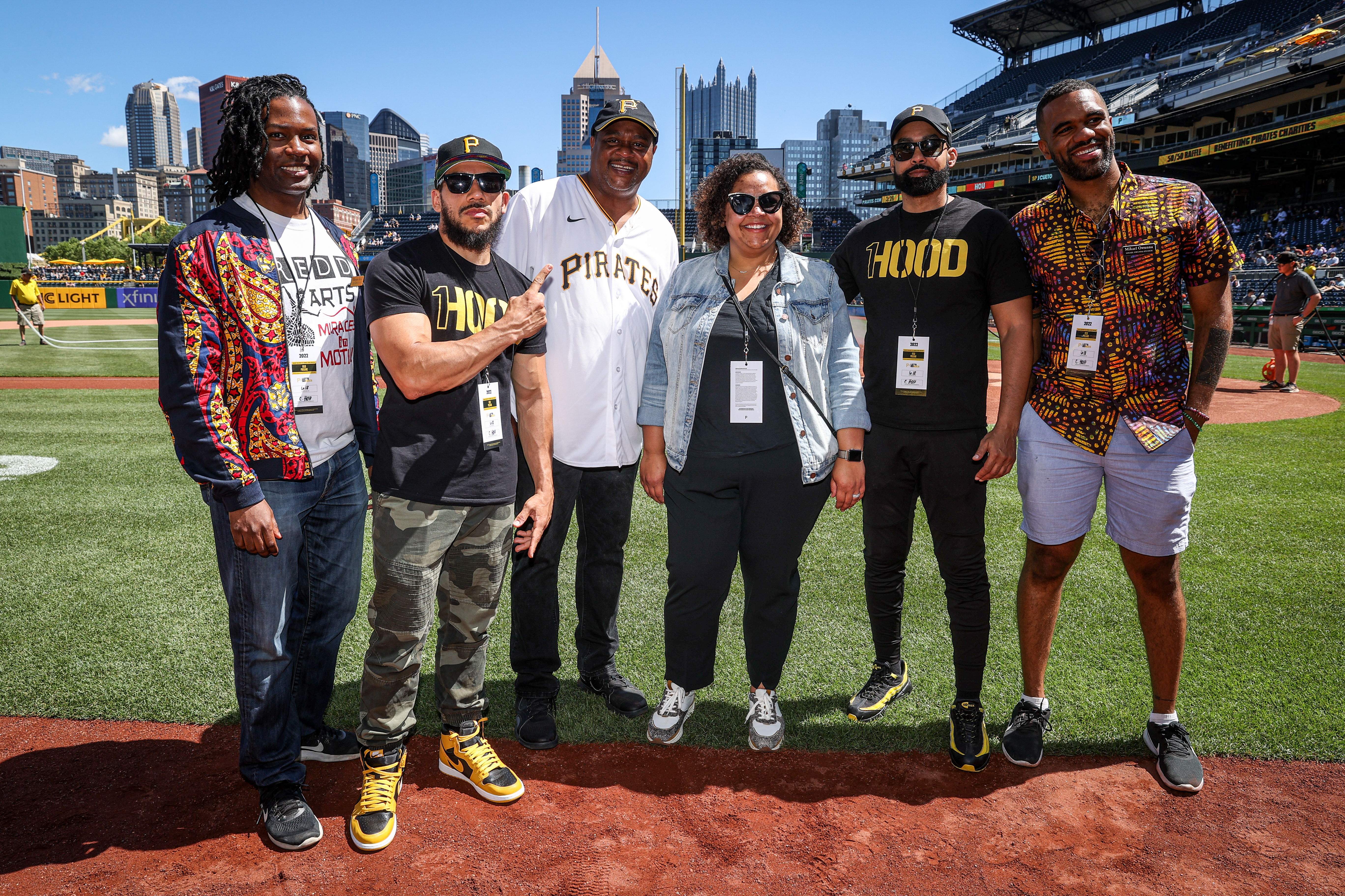 Pictured (from left): artist Marques Redd, 1Hood Media Director of Operations Farooq Al-Said, Pittsburgh Mayor Ed Gainey, DLC Community Relations Manager Sam Hartzman, local rapper and CEO/Founder of 1Hood Media Jasiri X, and artist Mikael Owunna