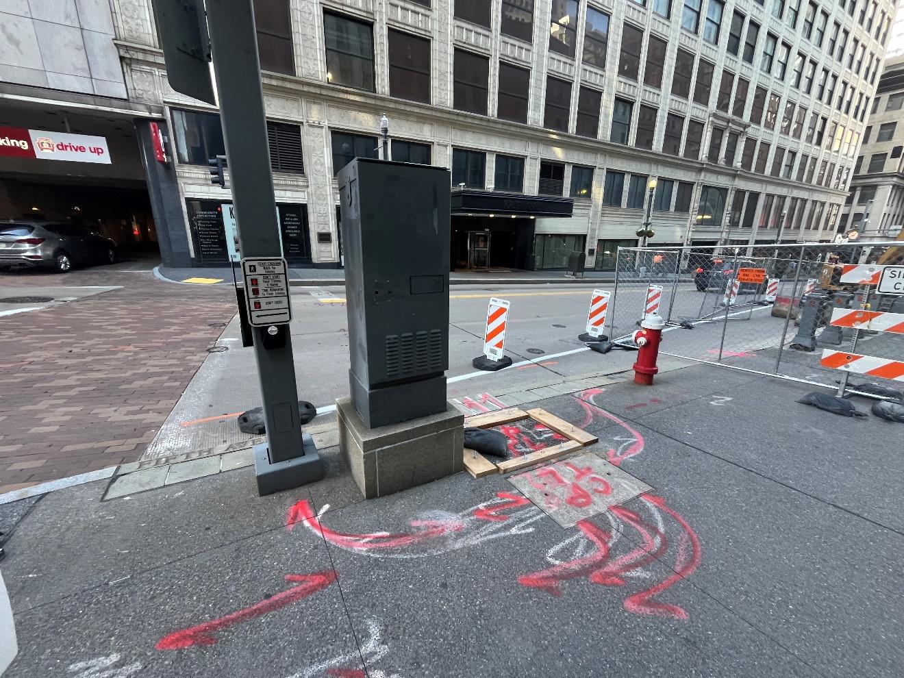 Traffic Signal Box with Pavement Markings in Preparation for Upcoming Work Traffic Signal Box with Pavement Markings in Preparation for Upcoming Work