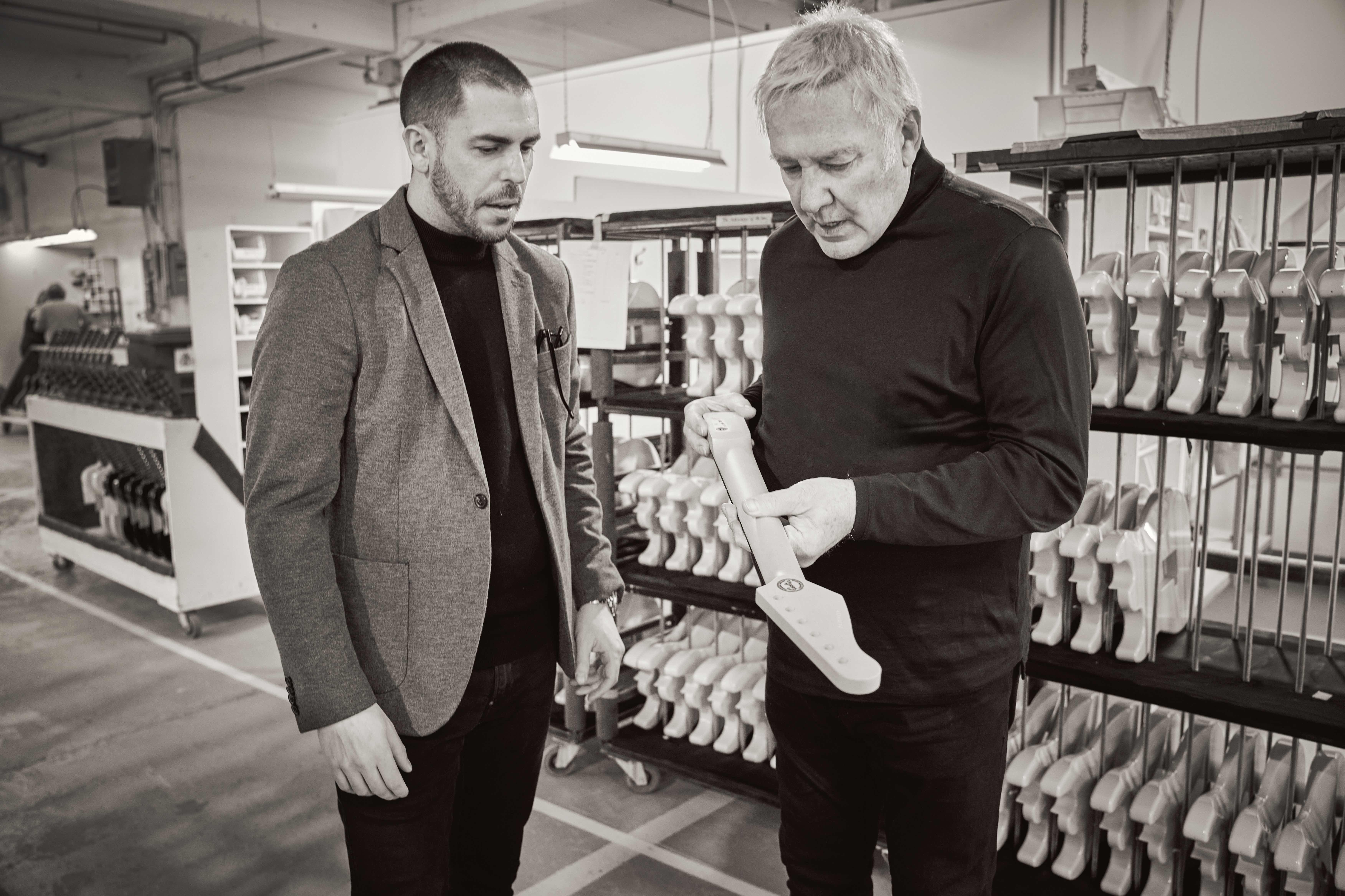 Simon and Alex examine Limelight guitar necks at the Godin factory