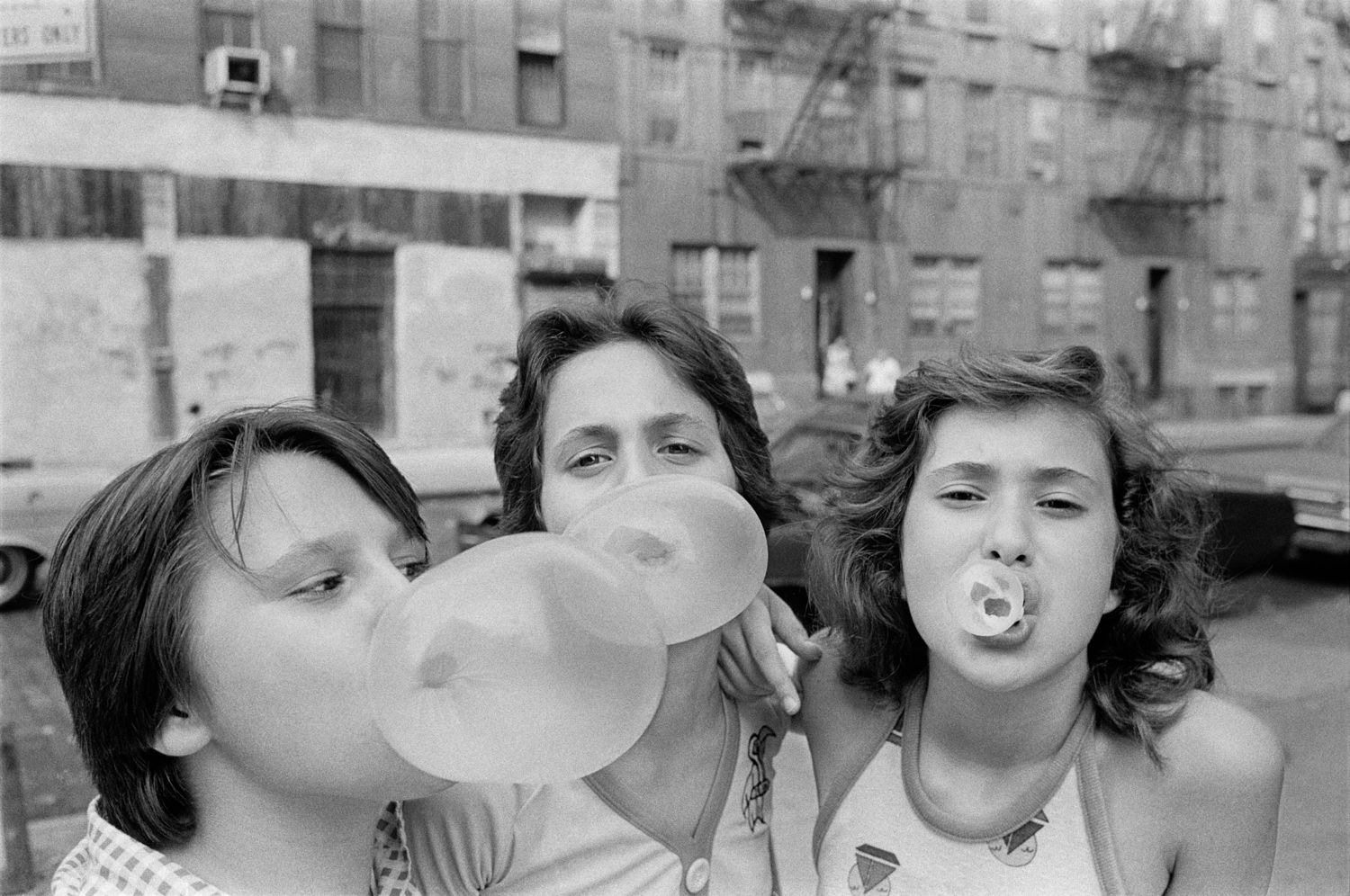 Carol, JoJo and Lisa hanging out on Broome Street, New York City, 1976 © Susan Meiselas / Magnum Photos 