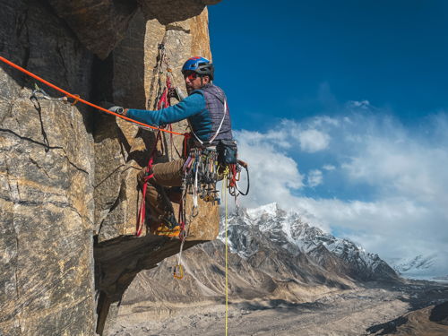 Andy Schnarf climbing the exposed and technical 8th pitch. Photo: Stephan Siegrist