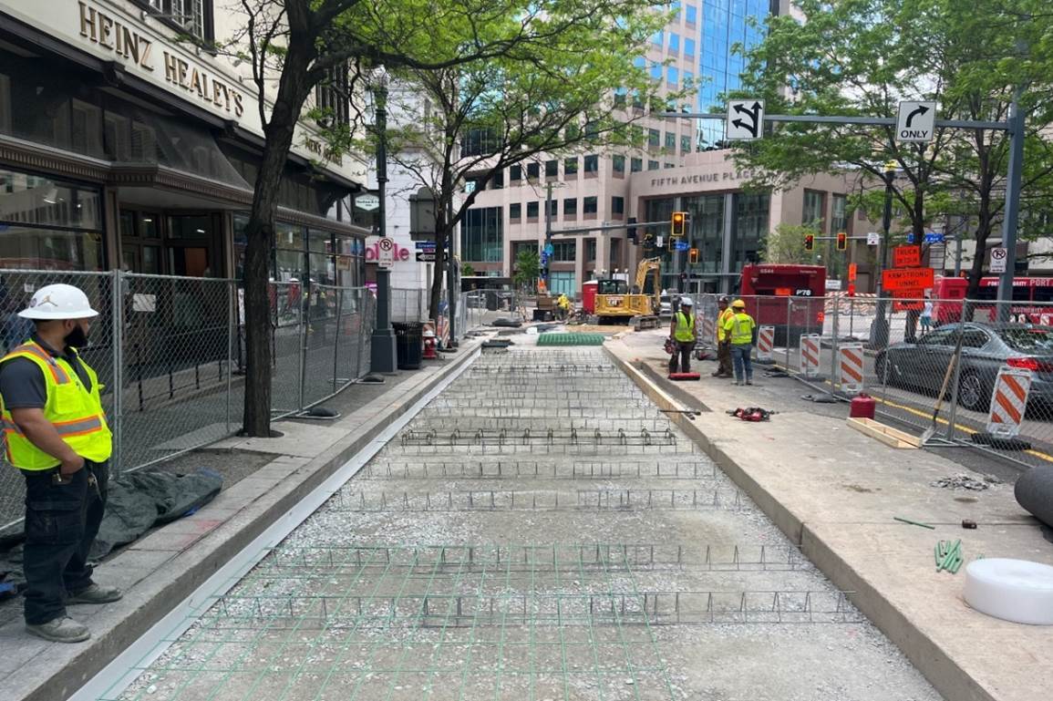 Contractors preparing to pour concrete at Fifth and Liberty avenues