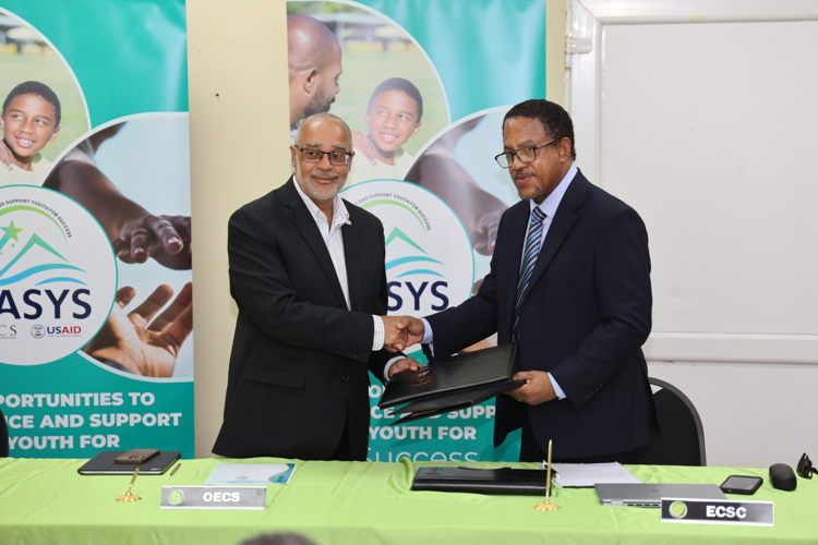 Dr Didacus Jules, Director General of the OECS and His Lordship, the Honourable Mario Michel, Chief Justice (Ag.), ECSC