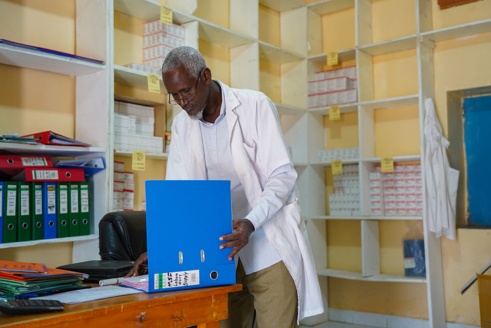 Mahad Sofe, dispensary assistant of the MSF-supported TB hospital in Galkayo North files patient records in the dispensary. | Date taken: 06/09/2024 | Copyright: MSF