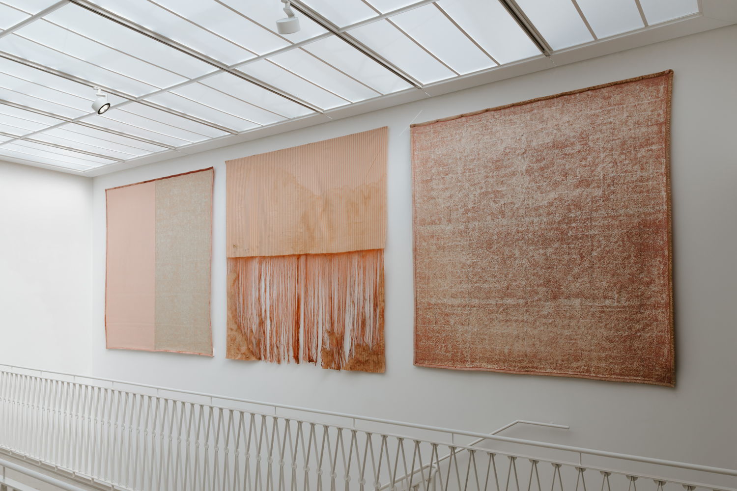  Installation view of Leaps of Faith at Z33, Hasselt. From left to right: Edith Dekyndt, White Gold on Pink Blanket, Underground “Bas du Roé”, Silver Leaves on Pink Blanket, 2019. Courtesy of the artist and Galerie Greta Meert. Photo: Selma Gurbuz.