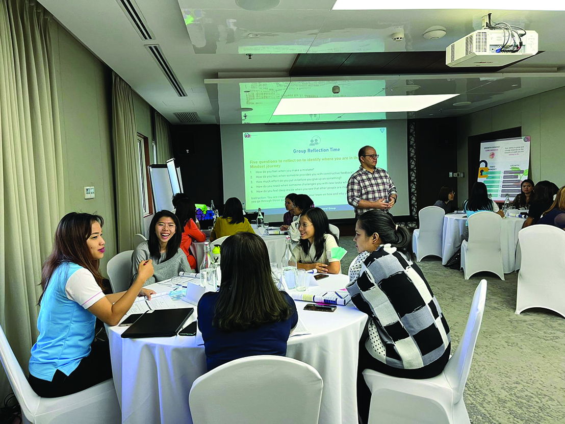 Myanmar participants exchanging ideas with one another during one of the group activities.