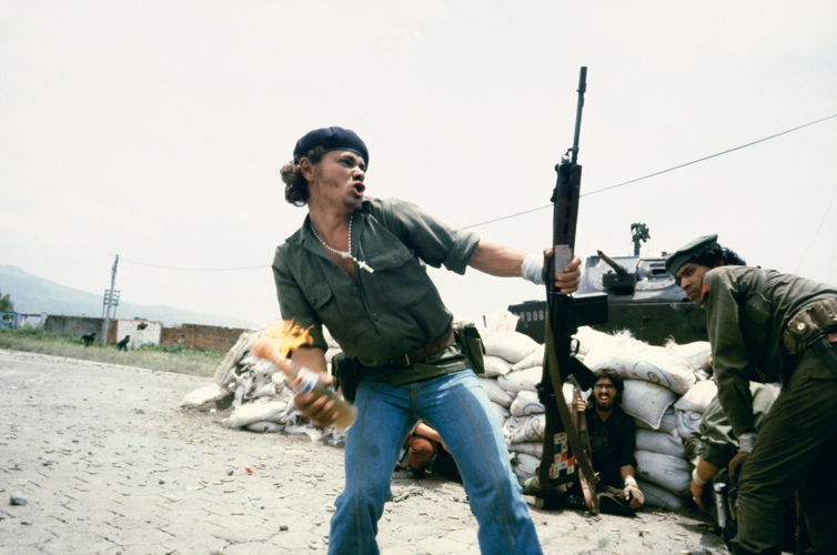 Sandinistas at the walls of the National Guard headquarters, ‘Molotov Man’, Estelí, Nicaragua, 1979 © Susan Meiselas / Magnum Photos 