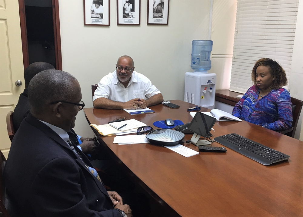 Mr. Alphonso Bridgewater, President of the ANOCES and Mr. Keith Joseph, Secretary General of the ANOCES, meet with Dr. Didacus Jules, OECS Director General, and Ms. Nadege Jn Baptiste, Programme Officer in the Development Cooperation and Resource Mobilisation Unit, at the OECS Headquarters in Castries, Saint Lucia.
