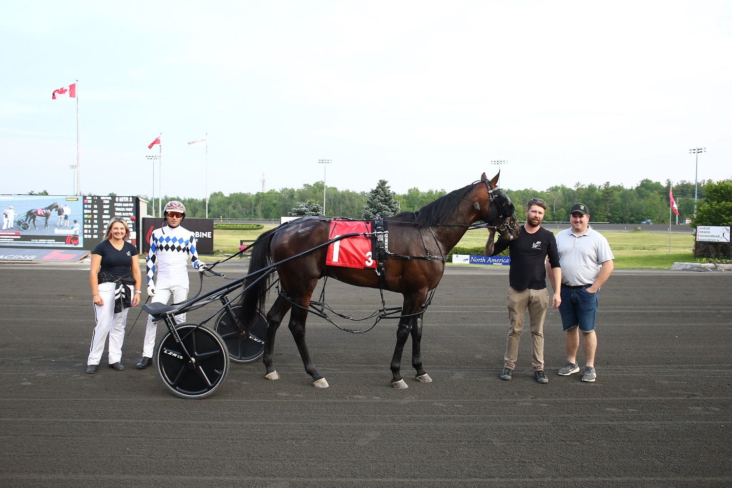 Christchurch and connections in the winner's circle after winning the first North Amercia Cup elimination on June 10, 2023 (New Image Media)