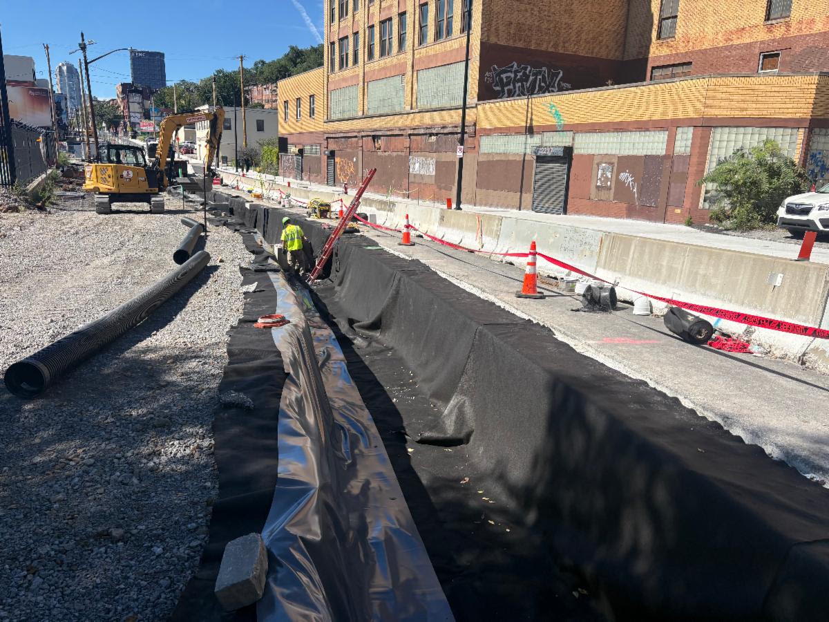 Contractors recently placed a liner in a future green infrastructure tank along Fifth Avenue near Moultrie Street Contractors recently placed a liner in a future green infrastructure tank along Fifth Avenue near Moultrie Street