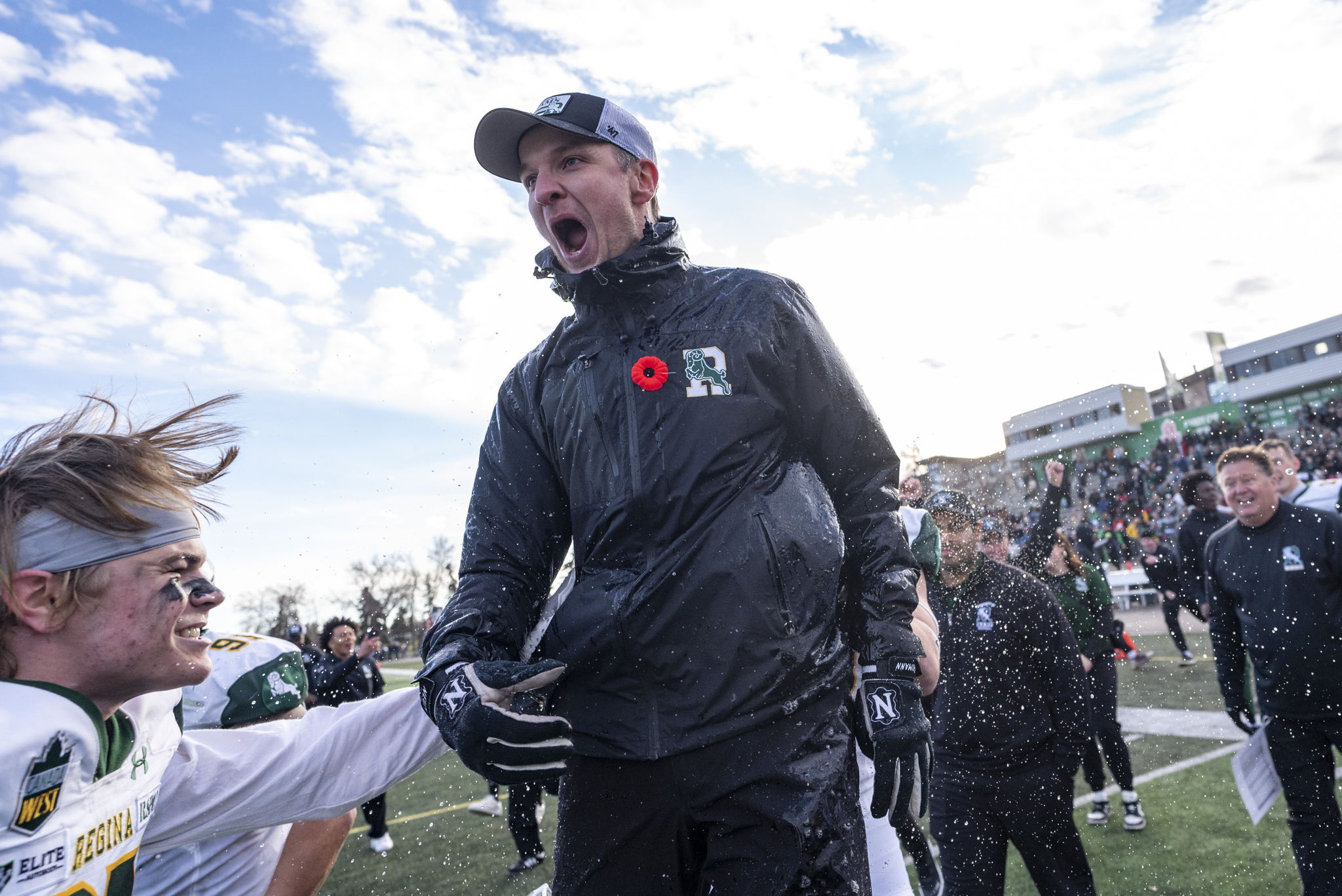 Rams head coach Mark McConkey received a BioSteel shower after the game.