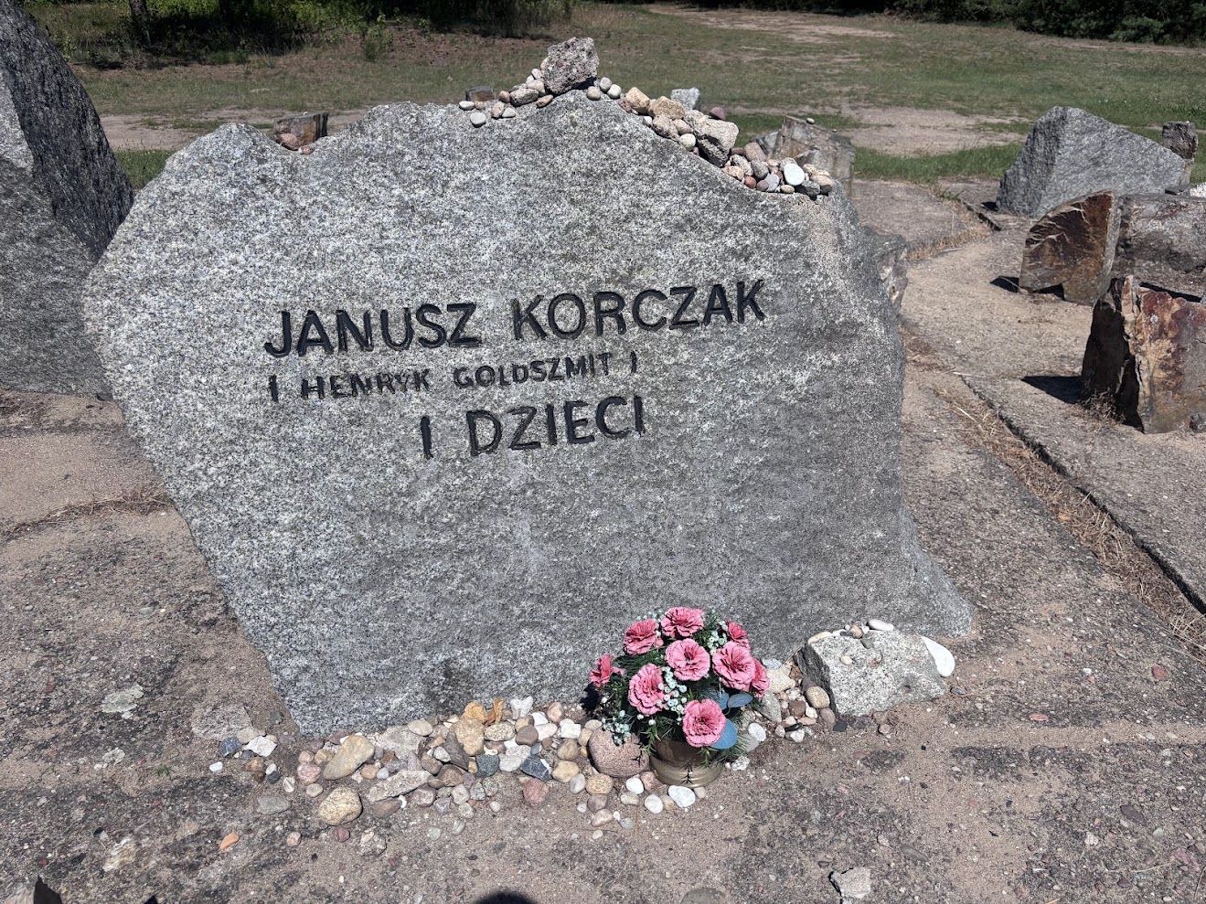 At the Treblinka Museum symbolic memorial cemetery, featuring roughly 17,000 uneven granite stones representing destroyed communities, the stone dedicated to Janusz Korczak and the Children is unique. It is the only individual memorial stone on the entire site that bears a specific person's name.