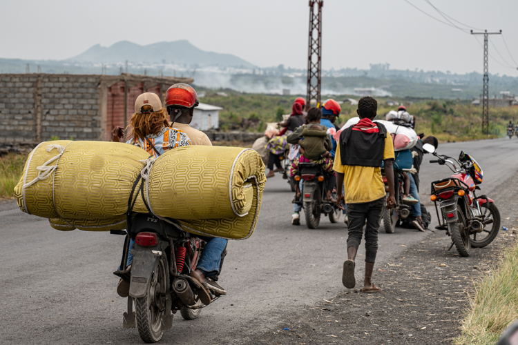 People living in camps, like Nzulo camp, are fleeing to Goma as fightings take place some kilometers away. Copyright: Moses Sawasawa 