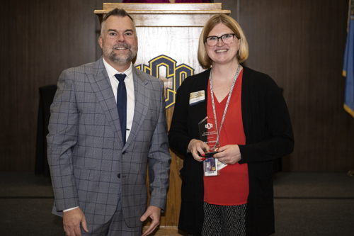 Katy Bingham and Bryan Duke, Ph.D., dean of the UCO College of Education and Professional Studies