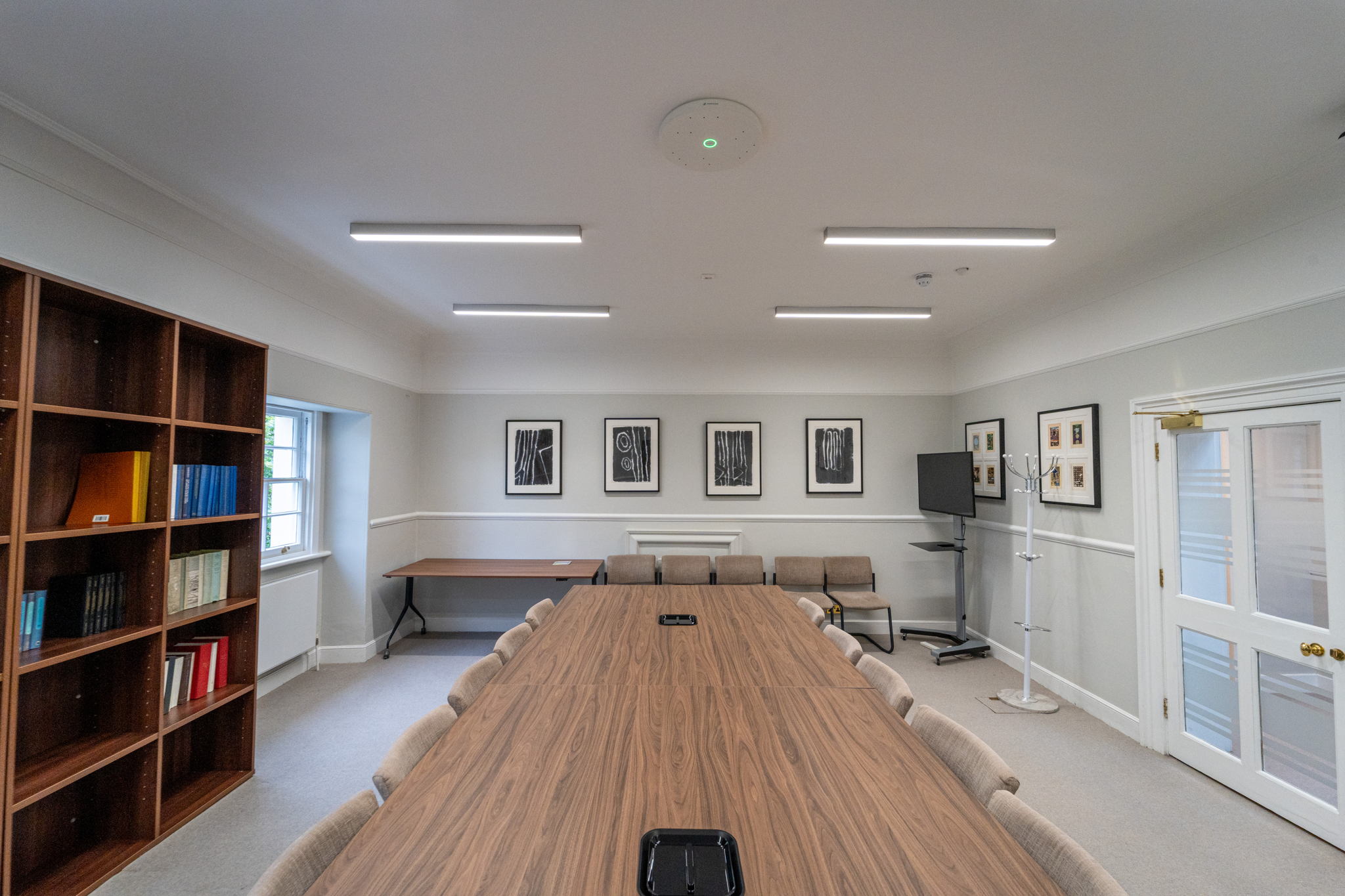 On the upper floors, meeting rooms such as the Helen Langan Room were outfitted with Sennheiser’s TeamConnect Ceiling Medium (TCC M) microphones, Logitech Tap touchscreens, and SpeechLine Digital Wireless systems On the upper floors, meeting rooms such as the Helen Langan Room were outfitted with Sennheiser’s TeamConnect Ceiling Medium (TCC M) microphones, Logitech Tap touchscreens, and SpeechLine Digital Wireless systems