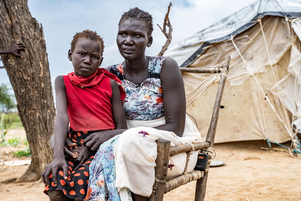 Adior Manut, 26, and her daughter Agor Manut Kor, 8, who received Malaria Drug Administration( MDA) to prevent malaria. Photographer: Paula Casado Aguirregabiria | Location: South Sudan | Date: 15/10/2024