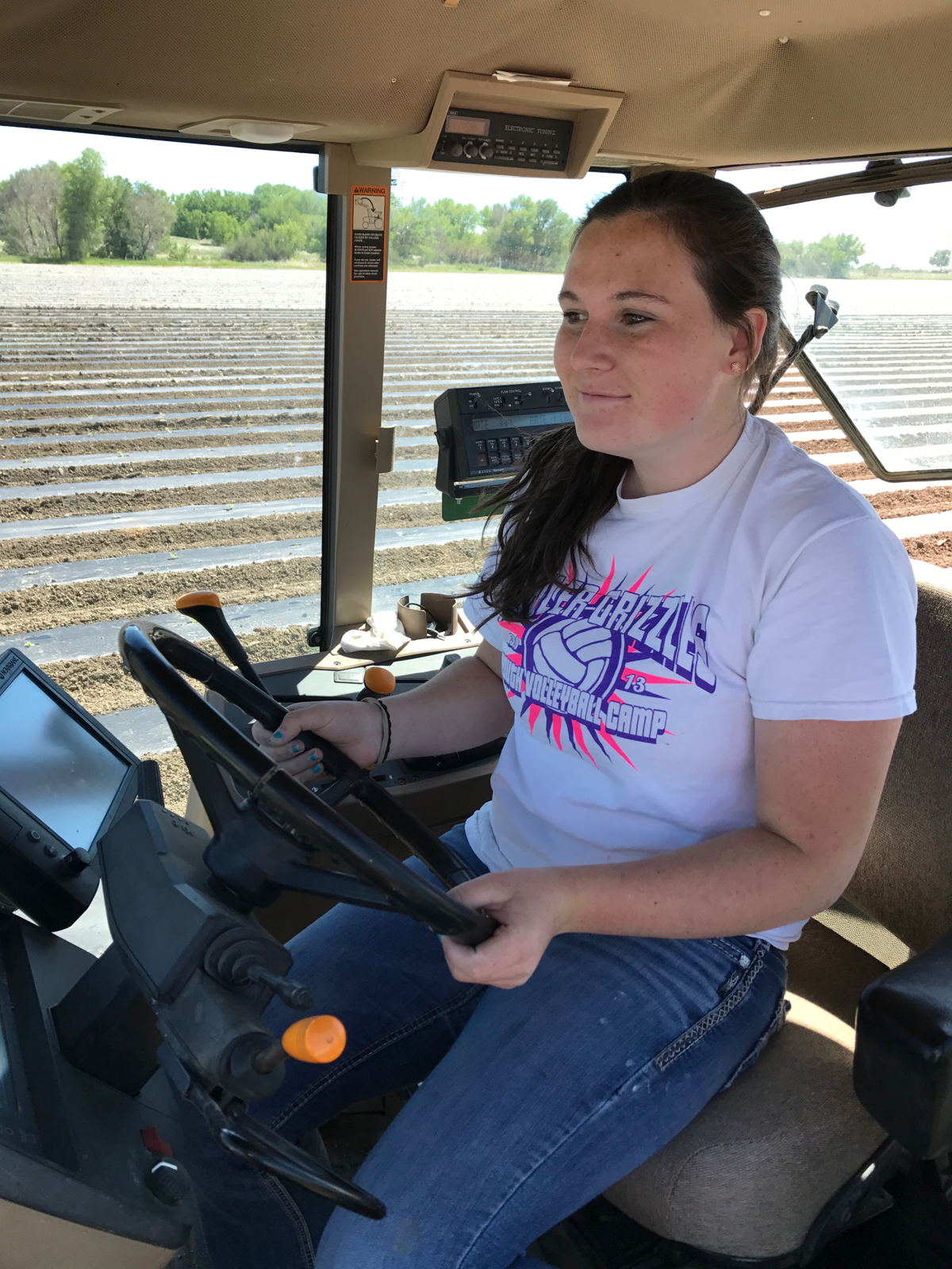 A young farmer from Proctor Produce helps get the planting job done!