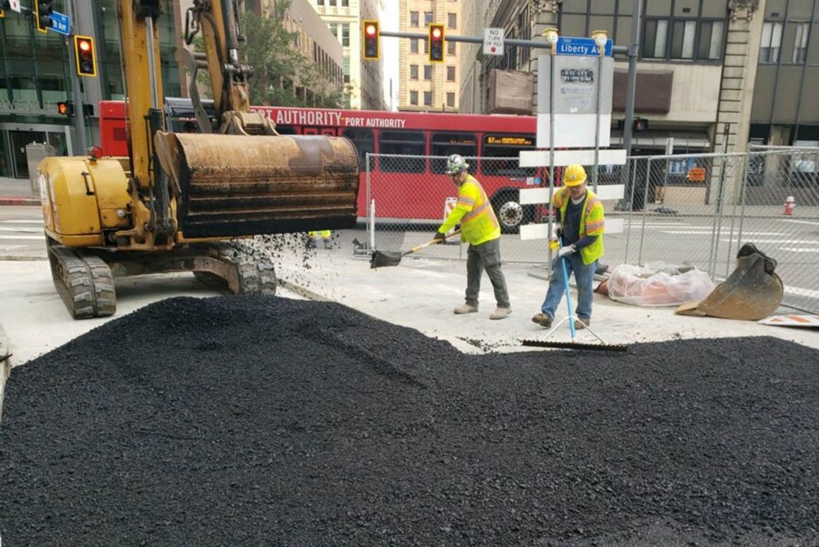 New Asphalt Being Placed at Fifth and Liberty Avenues New Asphalt Being Placed at Fifth and Liberty Avenues