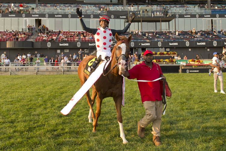 Patrick Husbands in the winners circle for the 2024 Rogers Woodbine Mile (Michael Burns Photo)