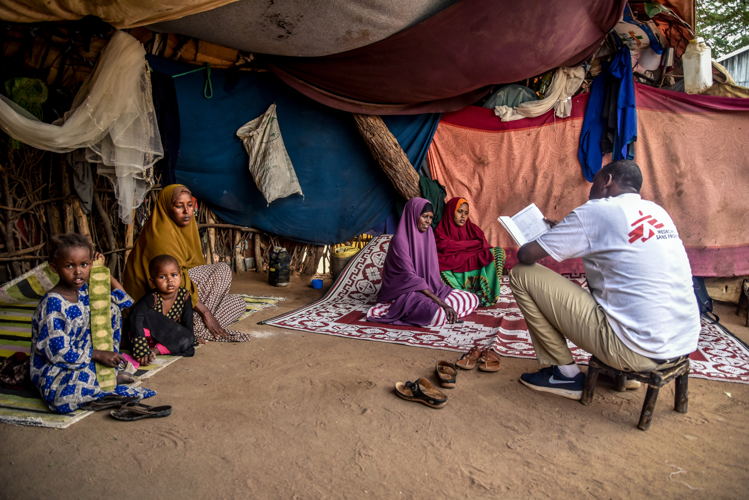 An MSF outreach staff holds a discussion with mothers in Dagahaley camp. Photographer: Paul Odongo An MSF outreach staff holds a discussion with mothers in Dagahaley camp. Photographer: Paul Odongo