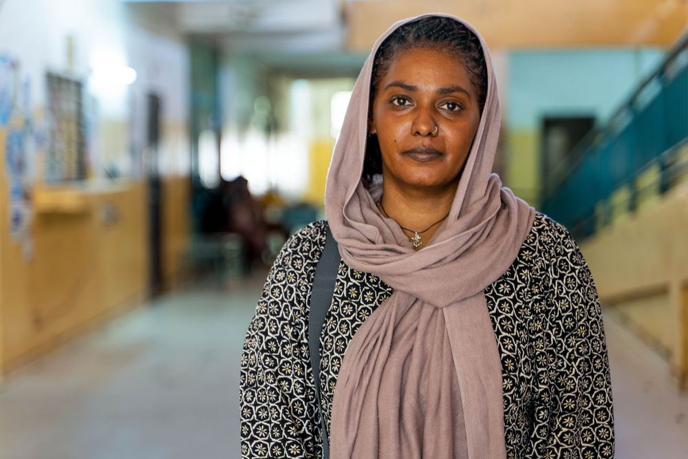 Dr Sarah Hassan Ibrahim. Sarah used to work for the Ministry of Health at the
​
emergency response department in the hospital. After the current conflict started in Khartoum, Sarah
​
took over as medical director at Bashair hospital. Sarah worked with medical staff from other hospitals.
​ They came to Bashair when it was closed and there was literally no one there.They managed to get
​ the hospital to start receiving patients. Sarah says “It was a relief to have MSF team here as the
​ demand especially on the operating theatre team and other medical staff was huge”. | Date taken: 13/05/2024/ | Photographer: Ala Kheir | Location: Sudan