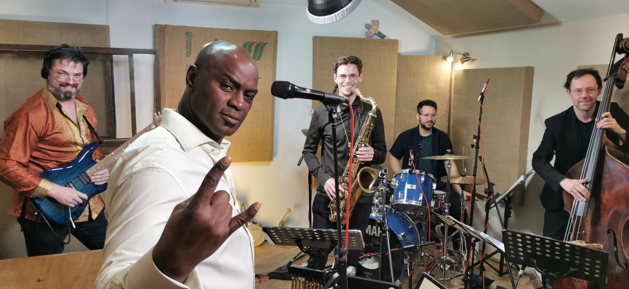 Left to right: Nick Meier (Guitar); Ola Onabulé (Vocals); Duncan Eagles (Saxophone); Chris Nickolls (Drums); Jakub Cywinski (Double Bass)