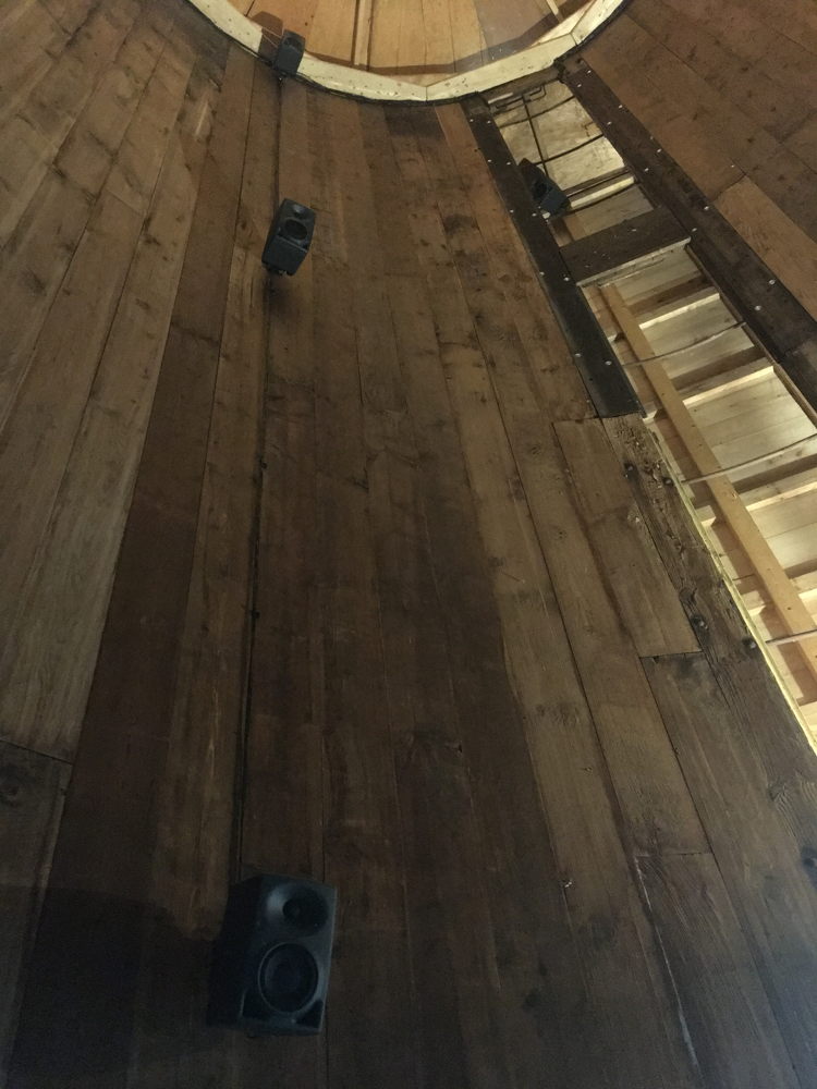 Three Neumann KH 80 DSP monitors attached to the inner wall of the silo
[Photograph provided by the Hancock Shaker Village]