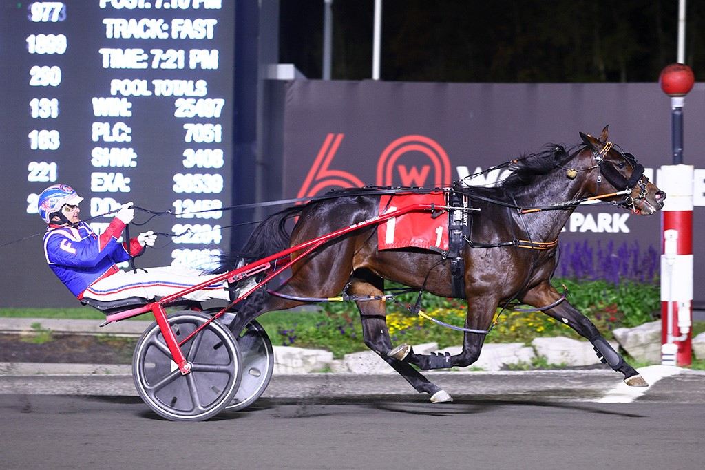 One More Bet and Sylvain Filion winning Monday's first-race, Filion's 10,000th career win. (New Image Media)