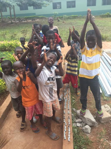 Children a Suma township while Changing Lives Together and Engineers Without Boarders built a solar project for the school.