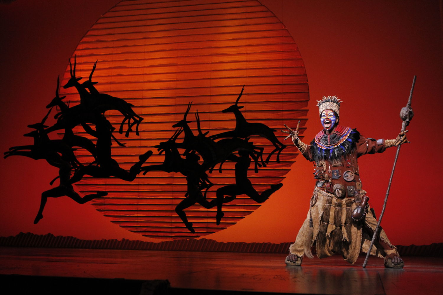 Buyi Zama as “Rafiki” in THE LION KING North American Tour.  ©Disney.  Photo by Joan Marcus.
