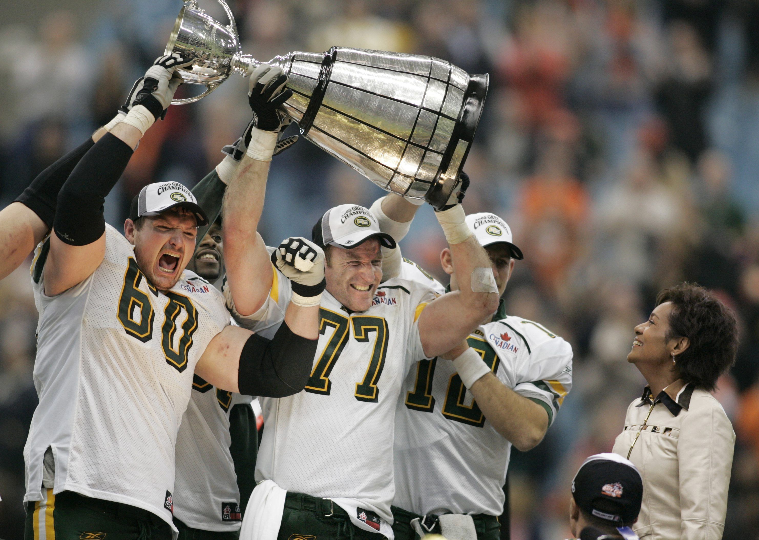 Chris Morris (60) celebrates the Eskimos' 2005 Grey Cup win over the Montreal Alouettes in Vancouver. Edmonton claimed the championship with a 38-35 overtime win at B.C. Place.