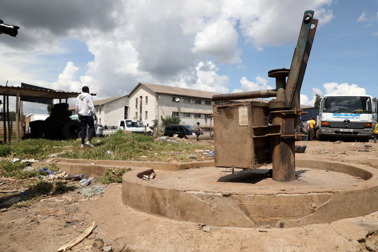 An old, dysfunctional, borehole is seen in the suburb of Mbare in Harare, Zimbabwe's capital city. Boreholes like these meant that residents often had to walk long distances to reach functional boreholes and access water. With the addition of MSF's new boreholes and solar pumps residents are now able to access clean water much  closer to home. Photographer: Dorothy Meck 