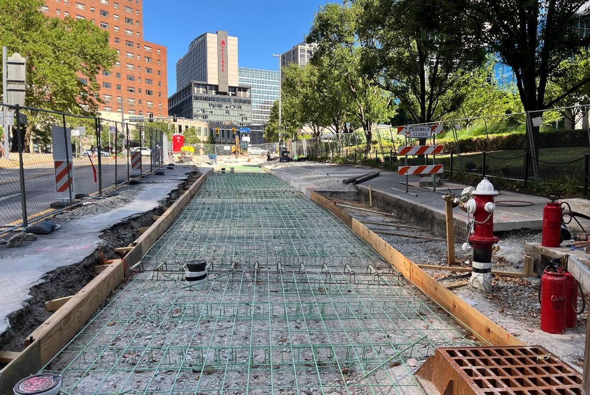 Inside the work zone at Sixth Avenue and Grant Street where the new roadway was framed with wood and reinforced with steel rebar before the concrete was poured Inside the work zone at Sixth Avenue and Grant Street where the new roadway was framed with wood and reinforced with steel rebar before the concrete was poured