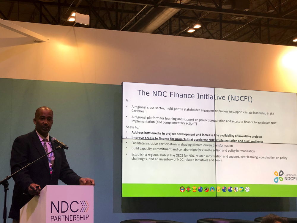 Crispin d'Auvergne, Coordinator for Climate Change and Disaster Risk Management in the OECS, addresses gathering at the Regional Pacific NDC Hub side event. Crispin d'Auvergne, Coordinator for Climate Change and Disaster Risk Management in the OECS, addresses gathering at the Regional Pacific NDC Hub side event.