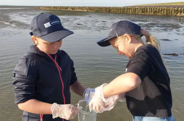 Students collect eDNA samples at five locations across the Wadden Sea World Heritage area © PHOTO SILKE ALHORN