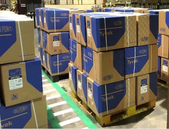 DuPont partnered with U.S. Department of Health and Human Services (HHS) and FedEx to provide expedited shipping of Tyvek® garments critical to COVID-19 relief efforts. Pictured here is an initial shipment of Operation Airbridge. 