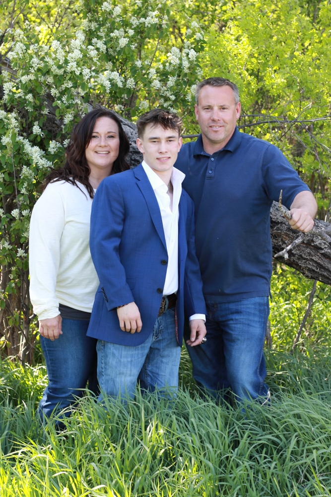 Fraser Aebly and his parents, Derek and Dale